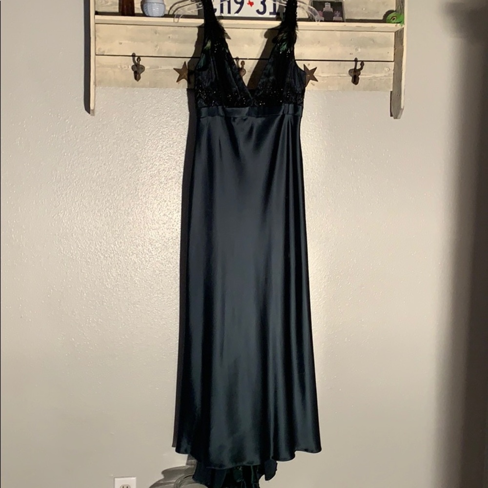 Gorgeous emerald green Carmen Marc Valvo gown